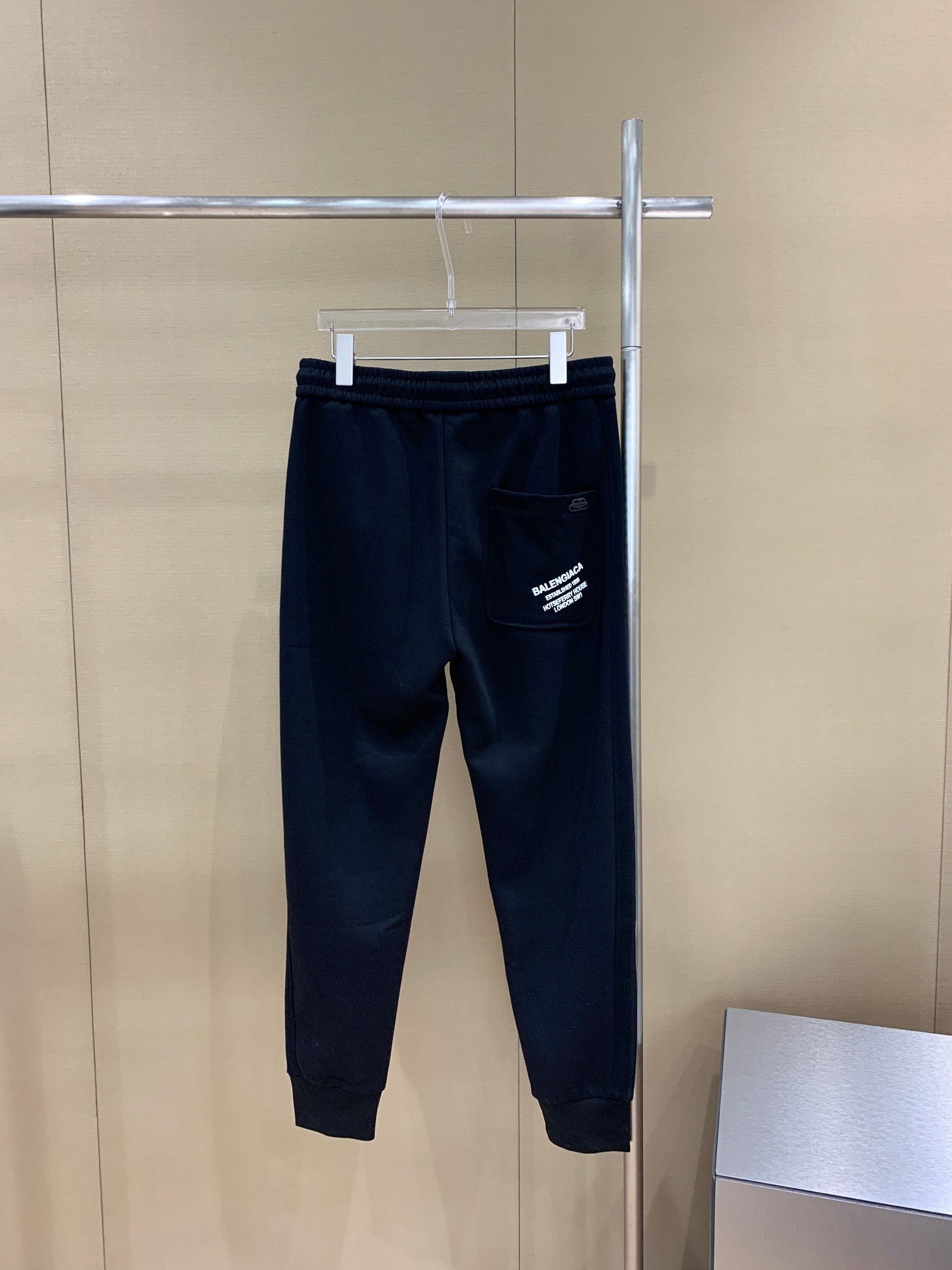 발렌시아가 더블B 오렌지 프린트 백포켓 자수 조거팬츠